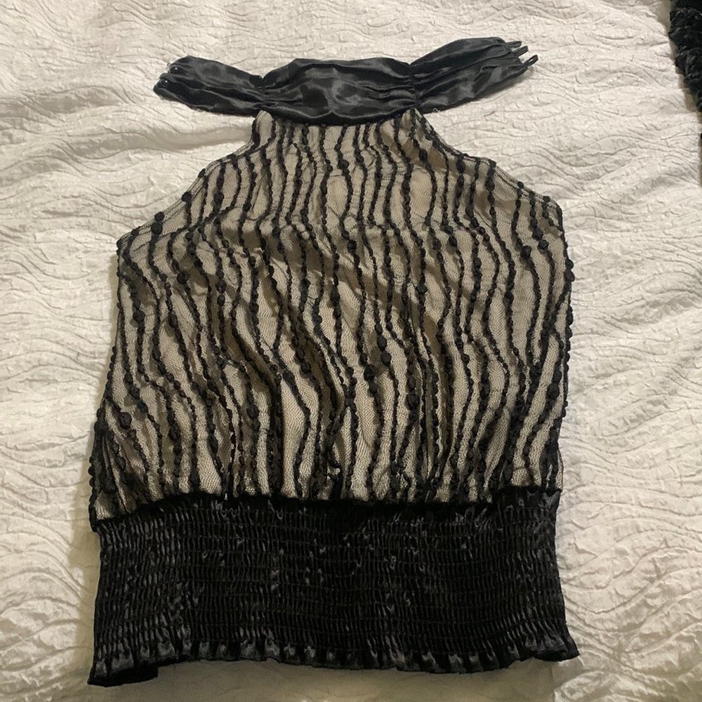 Never worn, basically brand new , skin tone lacy halter like dress top